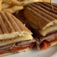 The Muffaletta · With ham, salami, provolone cheese, roasted peppers, and kalamata olive spread.