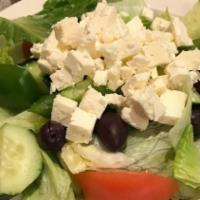 Greek Salad · Mixed greens, anchovies, feta cheese, black olives, tomatoes, green peppers, onions, and gra...