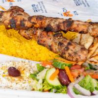 Chicken Souvlaki · Marinated and hand skewered chicken on a stick, grilled over a hardwood charcoal grill.
Serv...