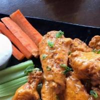 Chicken Wings · 10 Jumbo Wings. Boneless available for additional charge.
Choice of: Thai Chili, Sweet BBQ, ...