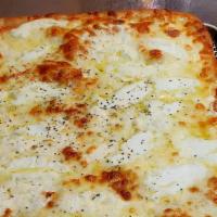 White Square Pie · Mozzarella cheese ricotta chesse and pecorino romano cheese no tomato sauce