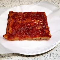 Upside Down Square Slice · Fresh mozzarella and secret sauce pecorino romano cheese and extra virgin olive oil