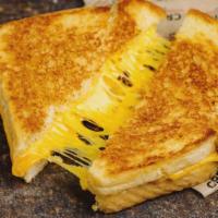 Grilled Cheese · Ronnybrook buttered bread and NY cheddar cheese.