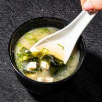 Classic Miso Soup · A Japanese classic with green onion, tofu and seaweed