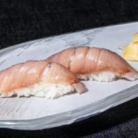 Yellowtail Sushi · Two sliced Yellowtail served on top of sushi rice
