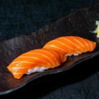 Salmon Sushi · Two Sashimi sliced Salmon served on top of sushi rice