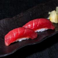 Tuna Sushi · Two Sashimi sliced Tuna served on top of sushi rice