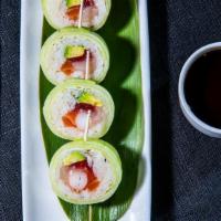 Katsuya Roll · Tuna, yellowtail, salmon, scallop, crab, and avocado wrapped in rice, soy paper and cucumber.