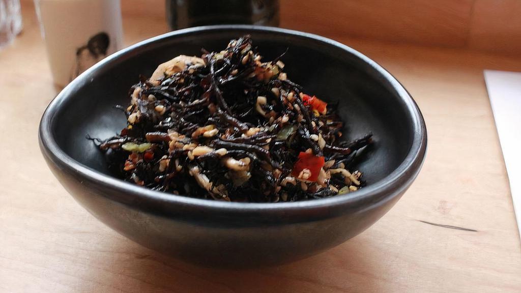 Hijiki And Lotus Root Salad · Hijiki seaweed, lettuce stem, lotus root, bell pepper, ginger, sesame seeds, and crushed red pepper.