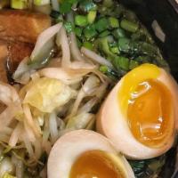 Taka'S Shoyu Ramen · Chicken broth, wavy flat flor noodles, leeks, chives, cabbage, and bean sprouts. Choice of p...