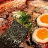 Tonkotsu Ramen · Pork broth, thin noodle, sliced pork belly, kikurage mushrooms, scallions, shredded red ging...