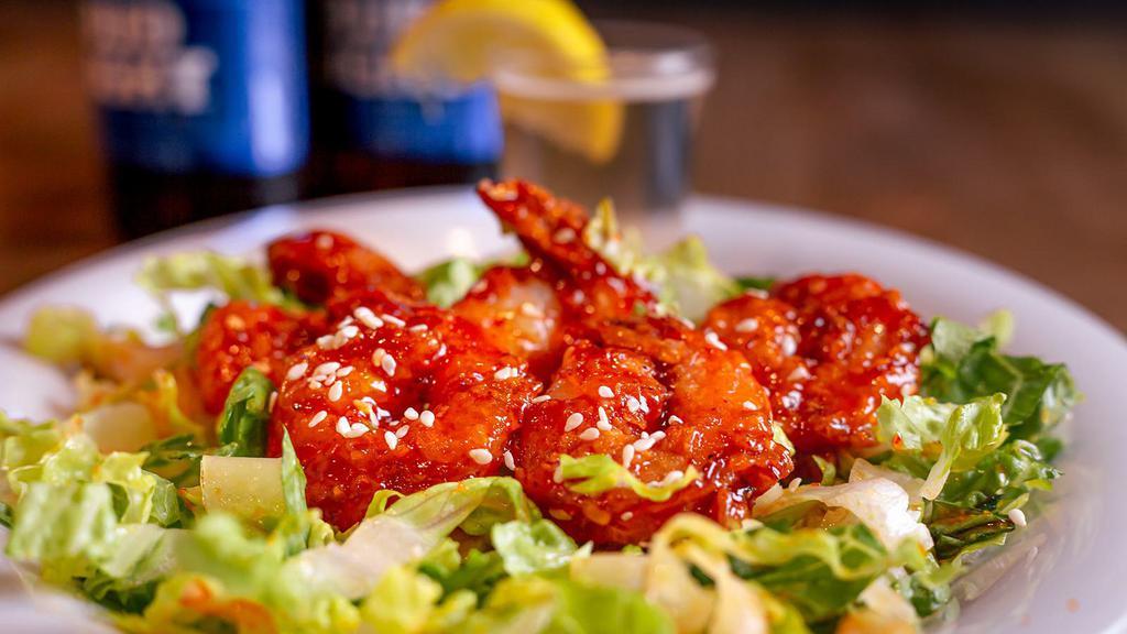 Firecracker Shrimp · Hand batter fried shrimp tossed in our sweet chili sauce.
