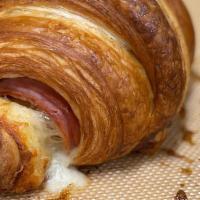 Ham & Swiss Croissant · Flaky and hardy all at once our ham and swiss croissant is among our customers favorites.