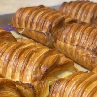 Chocolate Croissant · Light and flaky with rich chocolate inside.
