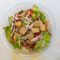 Chicken Caesar Salad · Lettuce, tomato, onions, grilled chicken, parmesan cheese, mozzarella cheese, croutons, ceas...