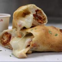Chicken Roll · Breaded chicken baked in a roll with tomato sauce and mozzarella cheese.