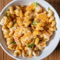 Garlic Shrimp Mac & Cheese · fresh shrimp in a cheese sauce tossed together with pasta served with a garlic crust.
