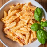 Penne Vodka Sauce · penne pasta tossed in a creamy sauce flavored with parmesan cheese.