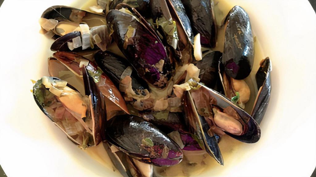 Steamed Mussels In White Wine · White wine, fresh garlic.
