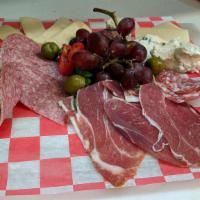 Antipasto Gennaro · Assortment of salami, prosciutto, mozzarella, provolone, parmigiana, olives and roasted pepp...