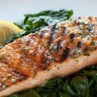 Grilled Salmon · Grilled salmon with garlic, lemon, parsley & white wine served with Linguini or vegetables