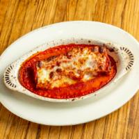 Lasagna · Home made meat bolognese, ricotta, fresh mozzarella.