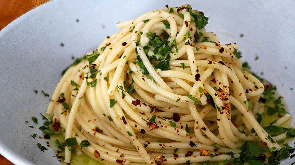 Spaghetti Aglio E Olio · Spaghetti with extra virgin olive oil & garlic.