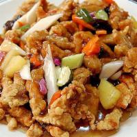 돼지탕수육 / Pork Tangsuyuk · Deep fried pork with fruits, veggies, and sweet and sour sauce.