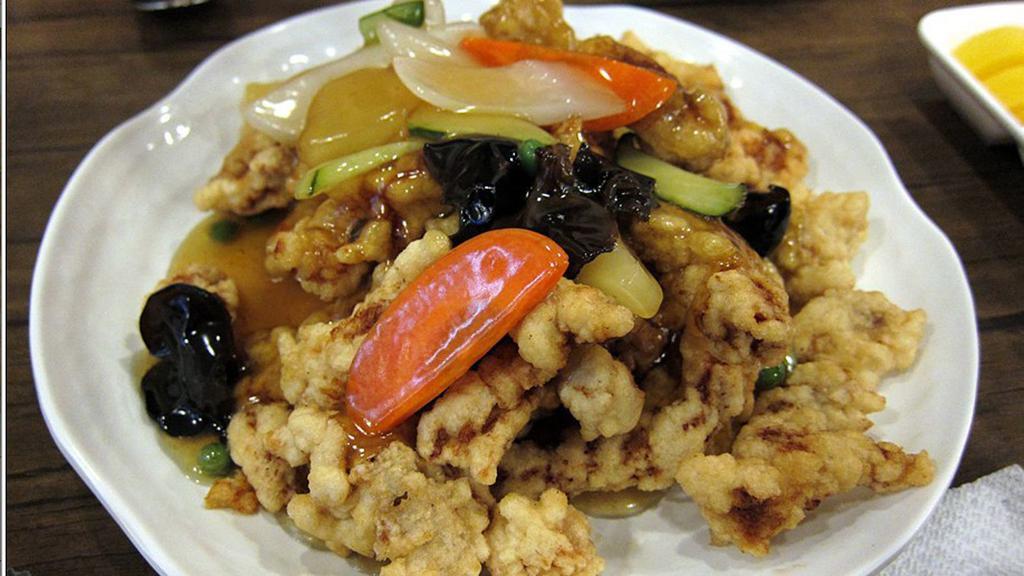 소고기 탕수육 / Beef Tangsuyuk · Deep fried beef with fruits, veggies, and sweet and sour sauce.