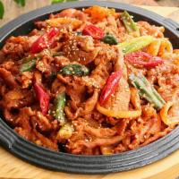 제육볶음 / Jeyuk Bokkeum · Spicy. Stir fried thick sliced pork belly and vegetables.