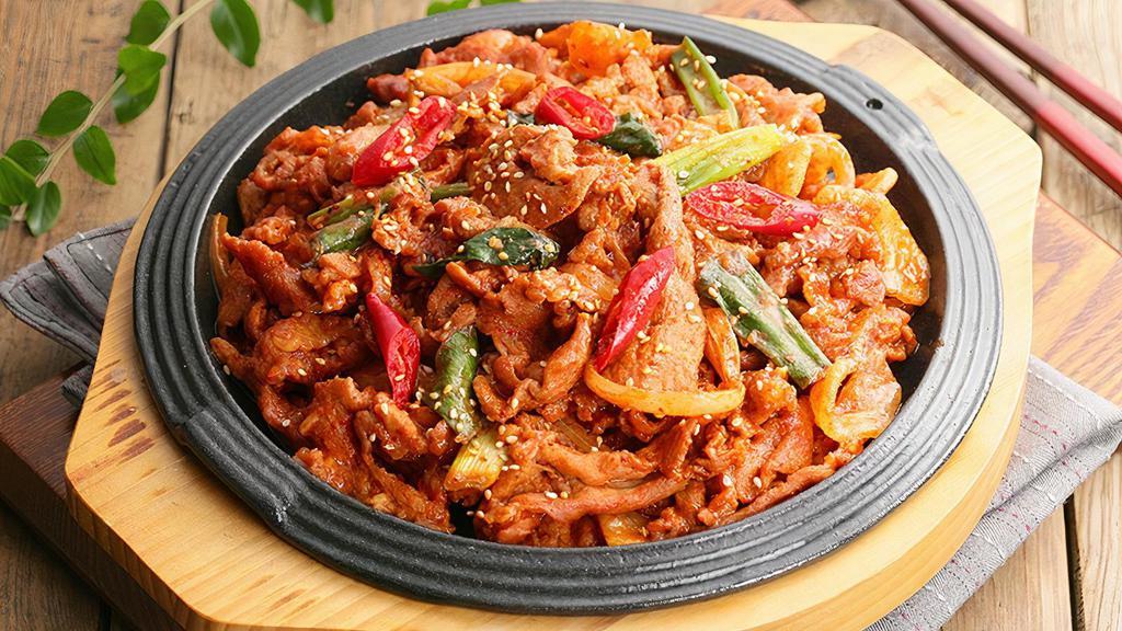 제육볶음 / Jeyuk Bokkeum · Spicy. Stir fried thick sliced pork belly and vegetables.
