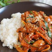 제육덮밥 Pork Deopbap · Spicy stir-fried pork over rice.