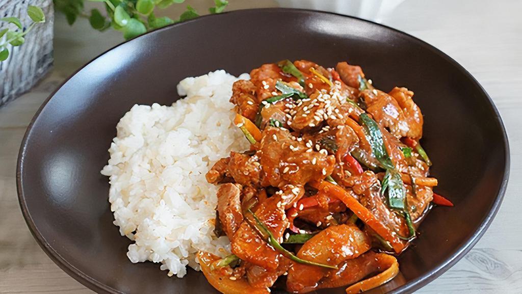 제육덮밥 Pork Deopbap · Spicy stir-fried pork over rice.