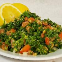 Tabouli · Tabouli is a levantine vegetarian salad made mostly of finely chopped parsley, with tomatoes...