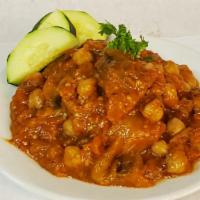 Vegetarian Moussaka · Cooked eggplant, chickpeas, with diced tomatoes, tomato sauce, onions, garlic and olive oil.