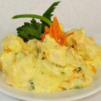 Potato Salad · Cut potatoes cook until tender whisk together with mayonnaise, vinegar, sugar, parsley, scal...