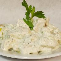 Chicken Salad · Cooked chicken breast mixed with mayonnaise, celery, green onion, dill and dijon mustard.