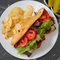 Brian Sandwich · Hot roast beef, mozzarella, bacon, lettuce, tomato, mayo on a hero.