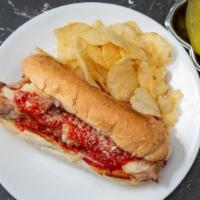 Chicken Parm Sandwich · Breaded cutlet, melted mozzarella, tomato sauce on a hero.