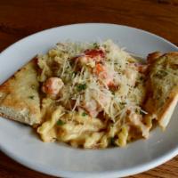 Lobster Mac · Tender premium lobster meat and delectable NYBP cheddar mascarpone cheese sauce, folded into...