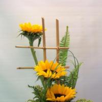 Sunflower Simplicity · Brightly colored sunflowers bring sunshine to any home.  Simply designed yet stylish.