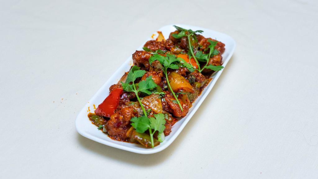 Chili Chicken Dry · Chinese. tender chicken with chili and onion cooked in hakka style.