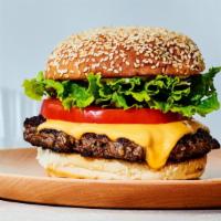Heinz 57® Burger · ½ pound burger, lettuce, tomato, HEINZ 57® sauce on a brioche bun.