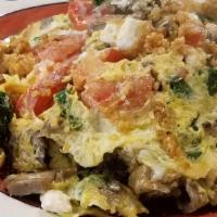 Mia’S Kitchen Sink Scramble · 2 eggs with lots of vegetables (add cheese +1. 00) - please don't ask what's in it - you're ...