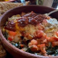 Red Baked Eggs · W/roasted veggies, fresh mozzarella, spinach and marinara - served w/multigrain toast.