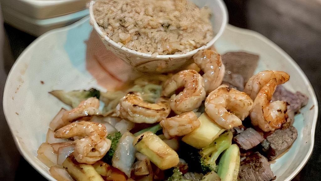 Steak & Shrimp · Served with mushroom soup, green salad, hibachi shrimp (cooked together) hibachi vegetables, and white rice.