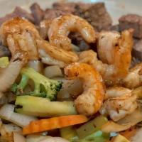 Filet Mignon & Shrimp · Served with mushroom soup, green salad, hibachi shrimp (cooked together) hibachi vegetables,...