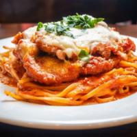 Chicken Parmigiana · Served with bread butter salad and pasta.