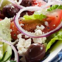 Greek Salad · Red grape tomatoes, lettuce, onion, black olives, cucumber, feta cheese, olive oil.