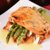 Pollo Matiz · Grilled chicken breast, asparagus, manchego cheese, parmesan cheese sauce, rosemary potatoes...